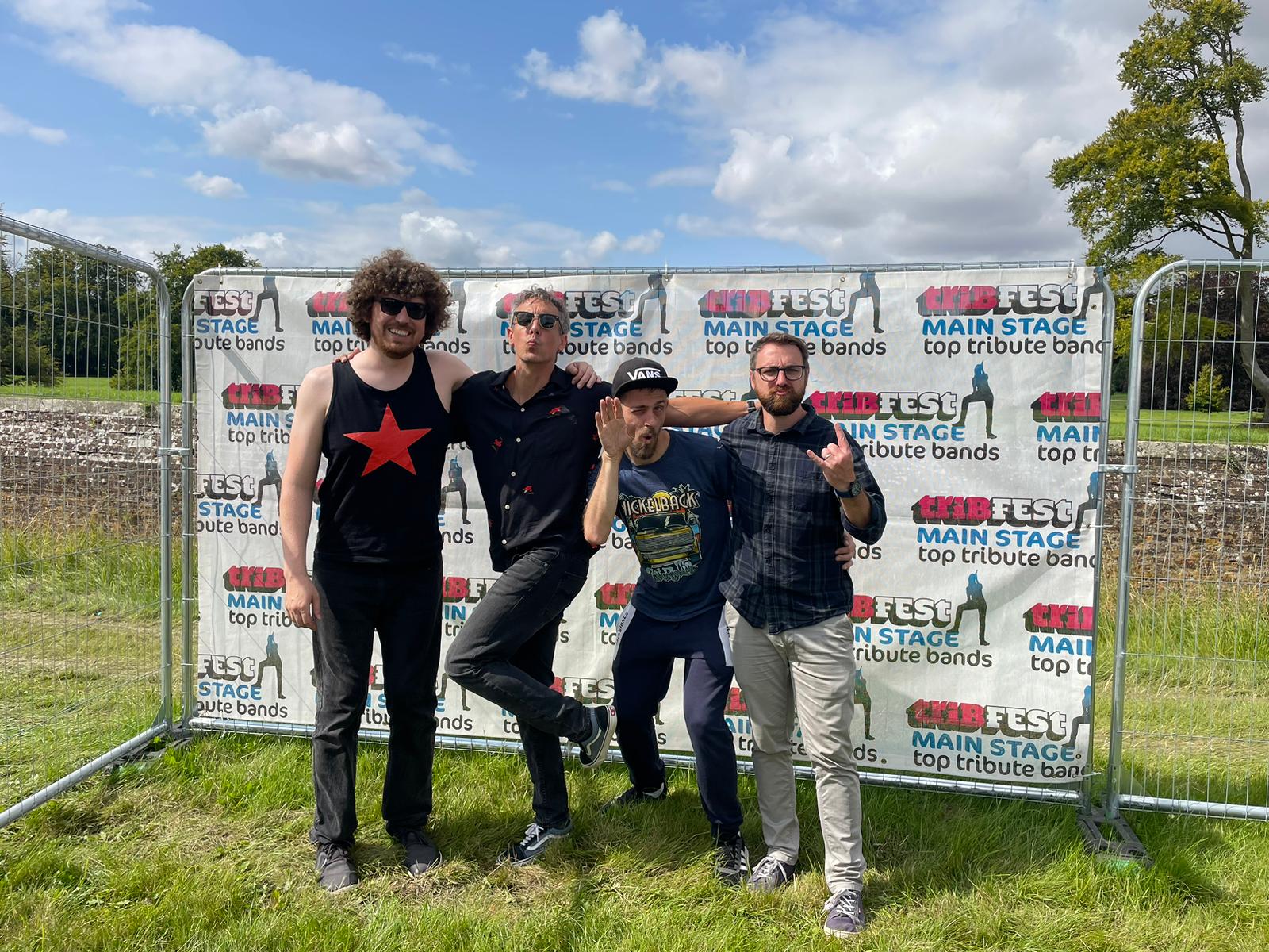 Rage Again The Machine backstage after their Tribfest 2024 main stage performance, celebrating a powerful live show.